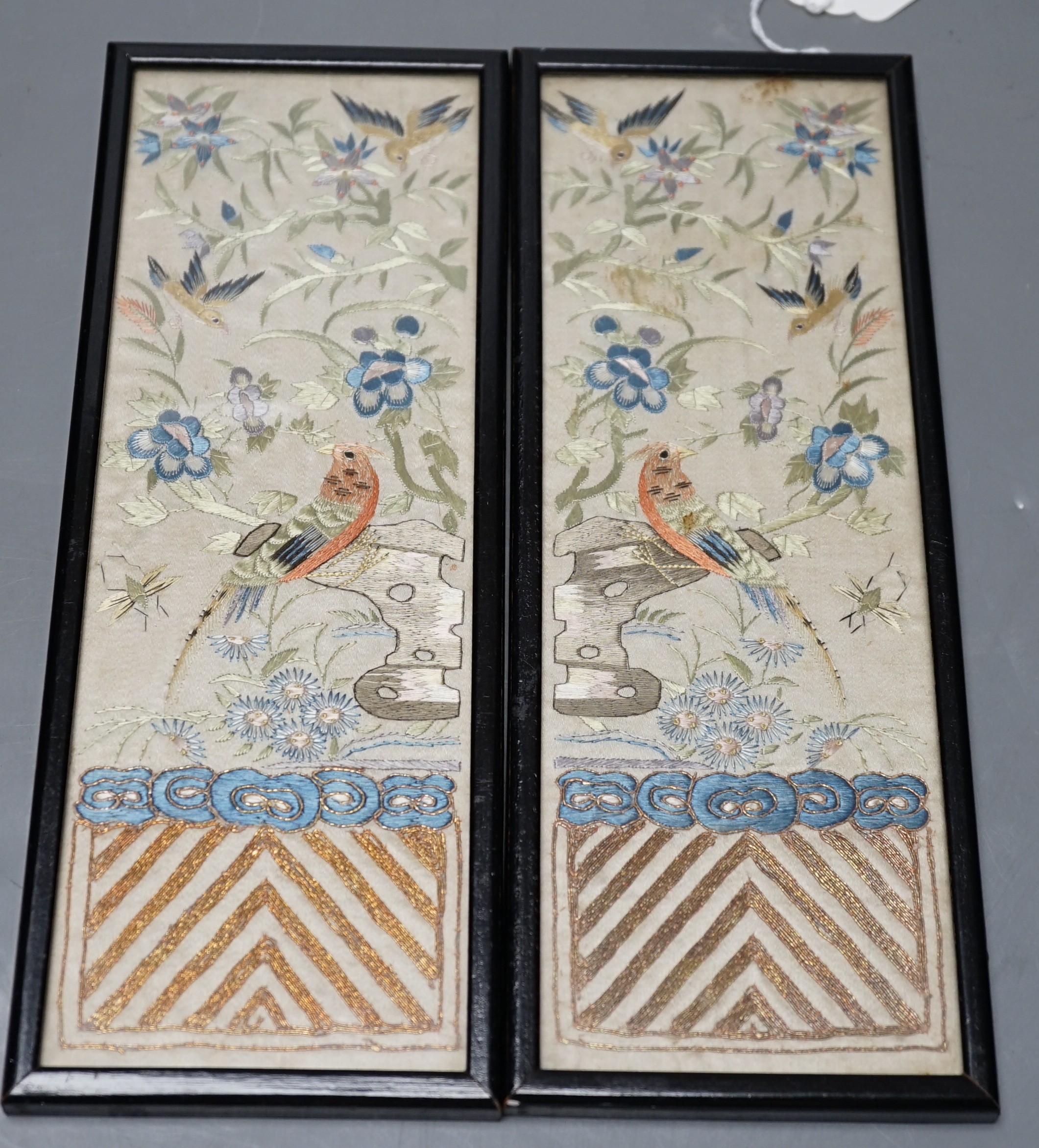 A pair of Chinese coloured silk pictures, framed, 24x9cm